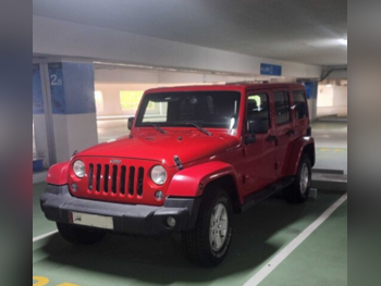 Jeep  Wrangler  Sahara  2015  Automatic  133,000 Km  6 Cylinder  Four Wheel Drive (4WD)  SUV  Red