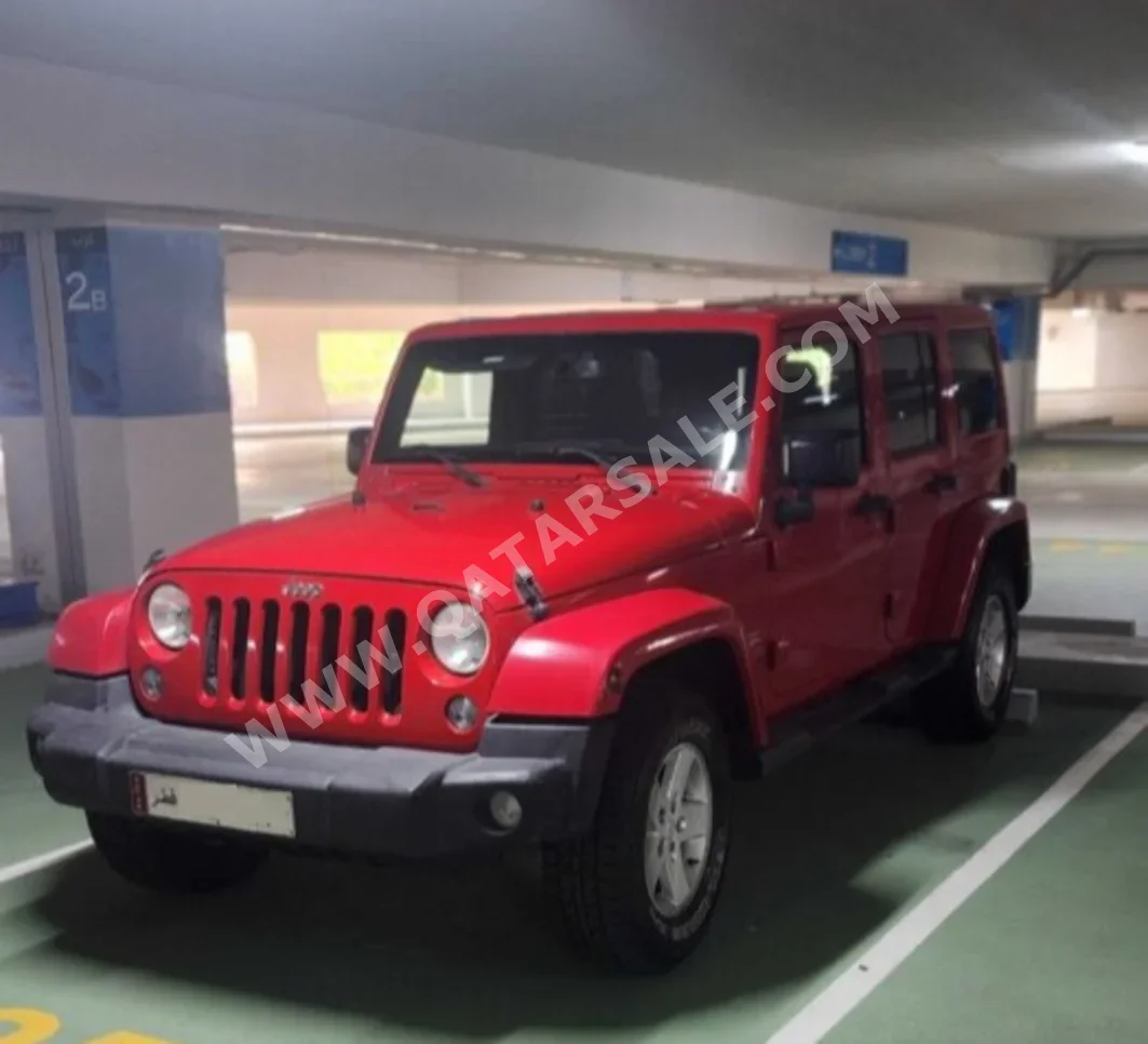 Jeep  Wrangler  Sahara  2015  Automatic  133,000 Km  6 Cylinder  Four Wheel Drive (4WD)  SUV  Red