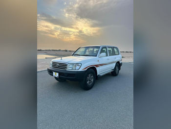Toyota  Land Cruiser  GX  2003  Manual  315,000 Km  6 Cylinder  Four Wheel Drive (4WD)  SUV  White