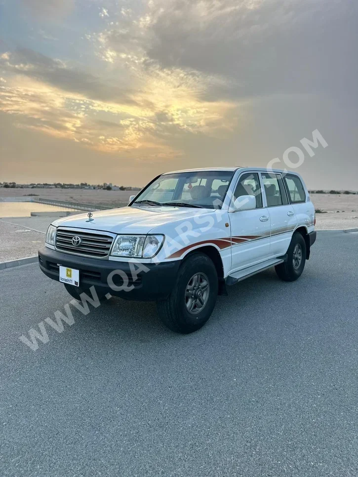 تويوتا  لاند كروزر  جي اكس  2003  عادي  315,000 كم  6 سلندر  دفع رباعي  اس يو في  أبيض