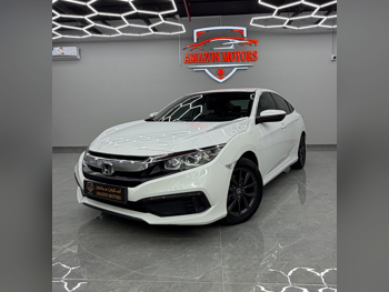 Honda  Civic  2020  Automatic  116,000 Km  4 Cylinder  Front Wheel Drive (FWD)  Sedan  White