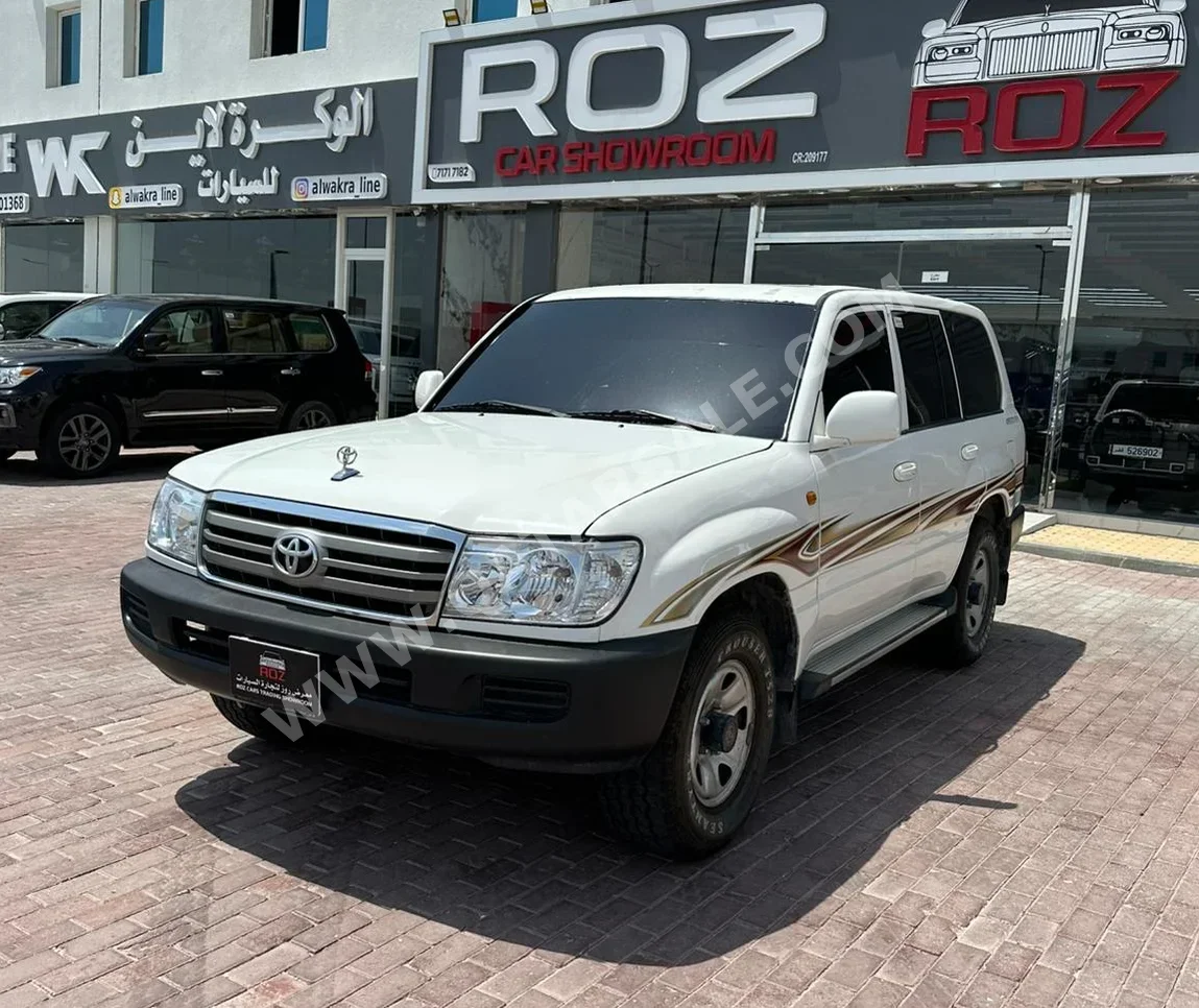 Toyota  Land Cruiser  GX  2006  Manual  351,000 Km  6 Cylinder  Four Wheel Drive (4WD)  SUV  White