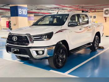 Toyota  Hilux  2026  Automatic  0 Km  4 Cylinder  Four Wheel Drive (4WD)  Pick Up  White  With Warranty
