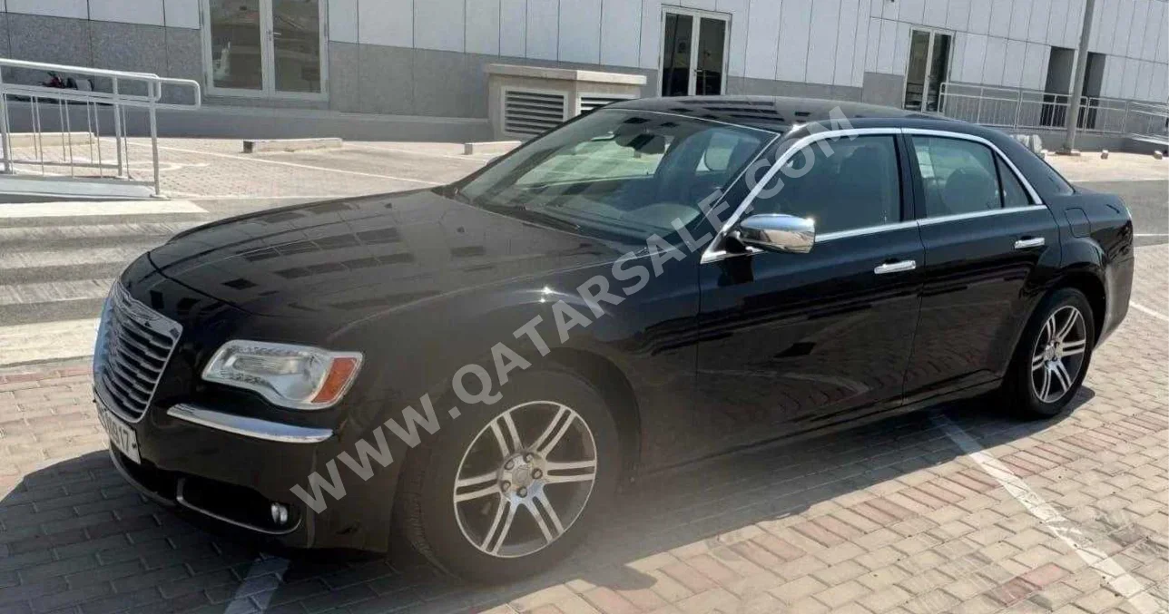 Chrysler  300C  2012  Automatic  130,000 Km  6 Cylinder  Rear Wheel Drive (RWD)  Sedan  Dark Blue and Red