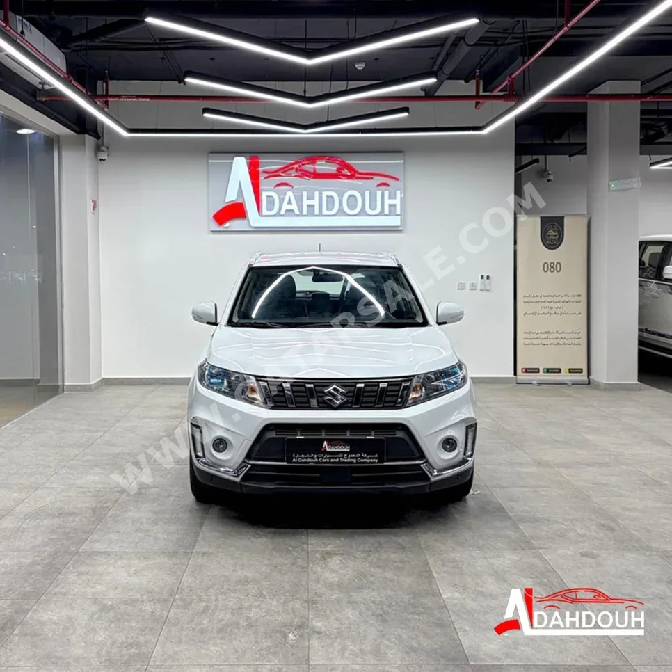 Suzuki  Vitara  2022  Automatic  99,000 Km  4 Cylinder  Front Wheel Drive (FWD)  Sedan  White