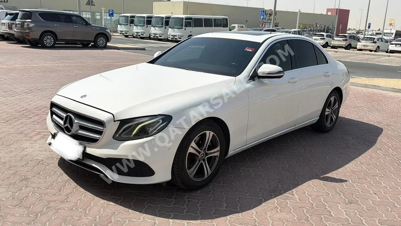 Mercedes-Benz  E-Class  200  2020  Automatic  116,000 Km  4 Cylinder  Rear Wheel Drive (RWD)  Sedan  White