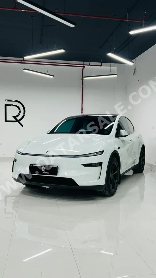 Tesla  Model Y  2026  Automatic  6,000 Km  0 Cylinder  All Wheel Drive (AWD)  Sedan  White  With Warranty