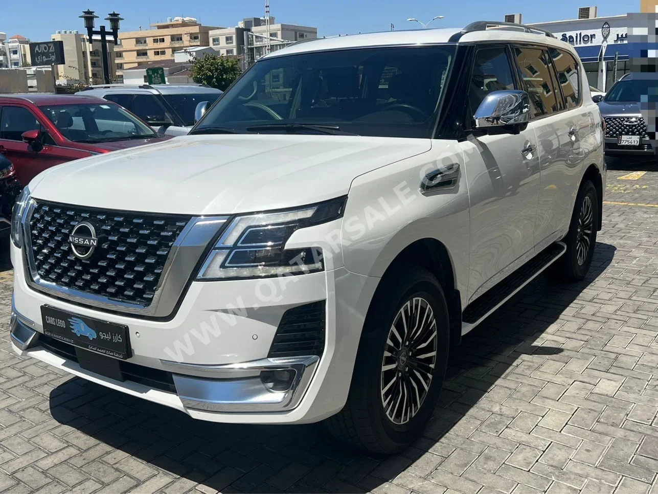 Nissan  Patrol  Platinum  2022  Automatic  56,000 Km  8 Cylinder  Four Wheel Drive (4WD)  SUV  Pearl