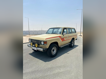 Toyota  Land Cruiser  G  1986  Manual  296,000 Km  6 Cylinder  Four Wheel Drive (4WD)  SUV  Beige