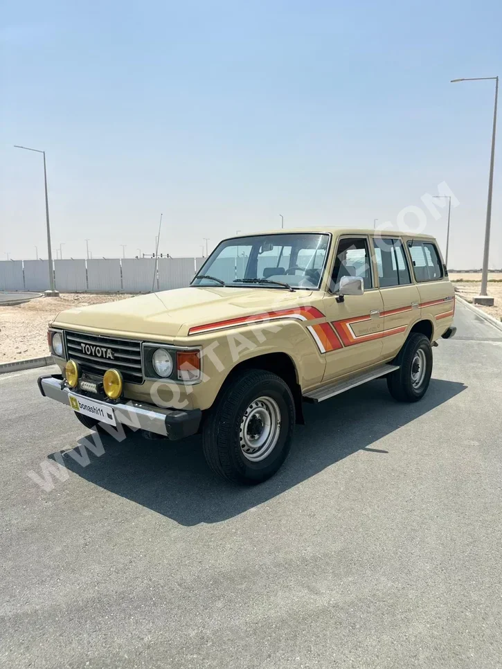 تويوتا لاند كروزر جي 1986 عادي 296,000 كم 6 سلندر دفع رباعي اس يو في بيج