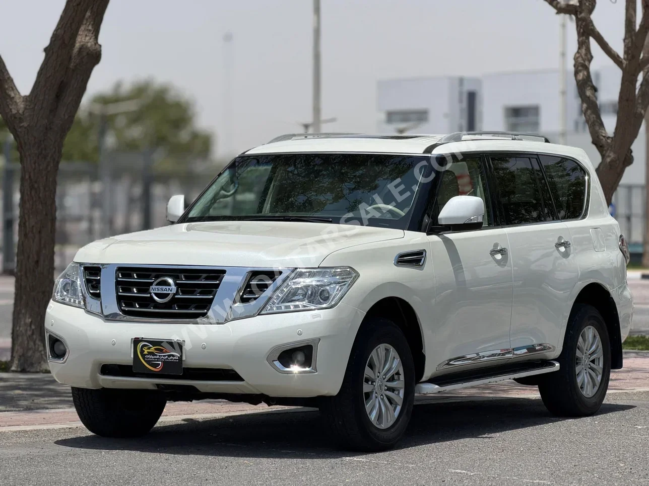 Nissan  Patrol  SE  2016  Automatic  200,000 Km  8 Cylinder  Four Wheel Drive (4WD)  SUV  White