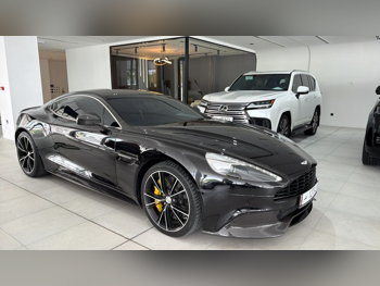 Aston Martin  Vanquish  2018  Automatic  61,000 Km  12 Cylinder  Rear Wheel Drive (RWD)  Coupe / Sport  Black  With Warranty