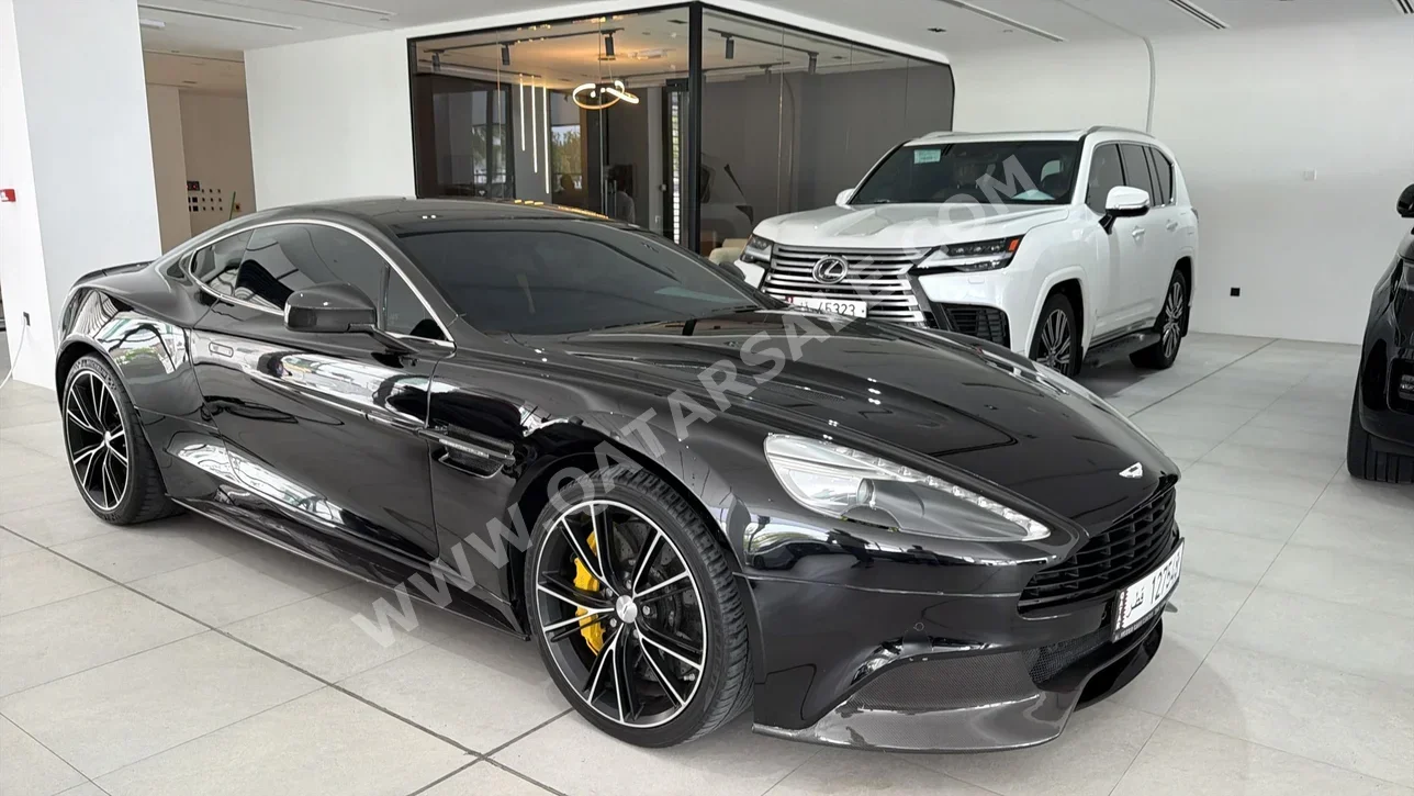 Aston Martin  Vanquish  2018  Automatic  61,000 Km  12 Cylinder  Rear Wheel Drive (RWD)  Coupe / Sport  Black  With Warranty