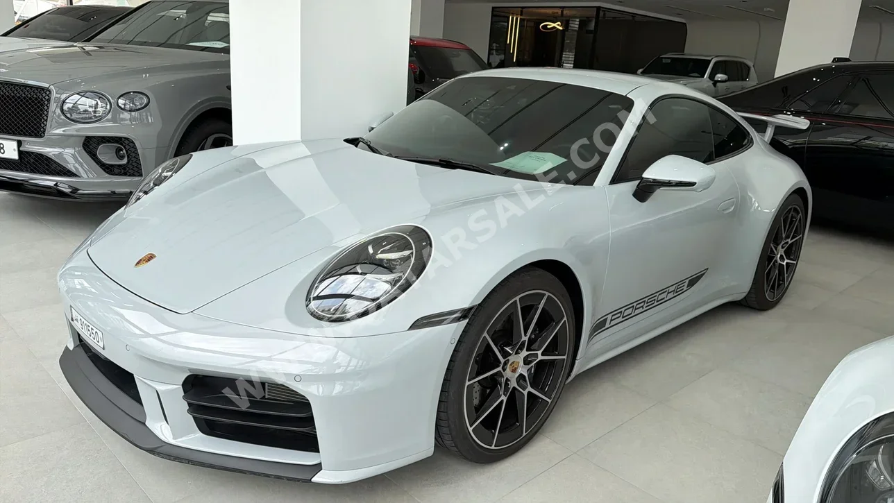 Porsche  911  Carrera  2025  Automatic  80,000 Km  6 Cylinder  Rear Wheel Drive (RWD)  Coupe / Sport  White  With Warranty