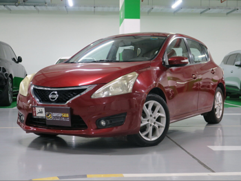 Nissan  Tiida  2014  Automatic  60,000 Km  4 Cylinder  Front Wheel Drive (FWD)  Sedan  Red