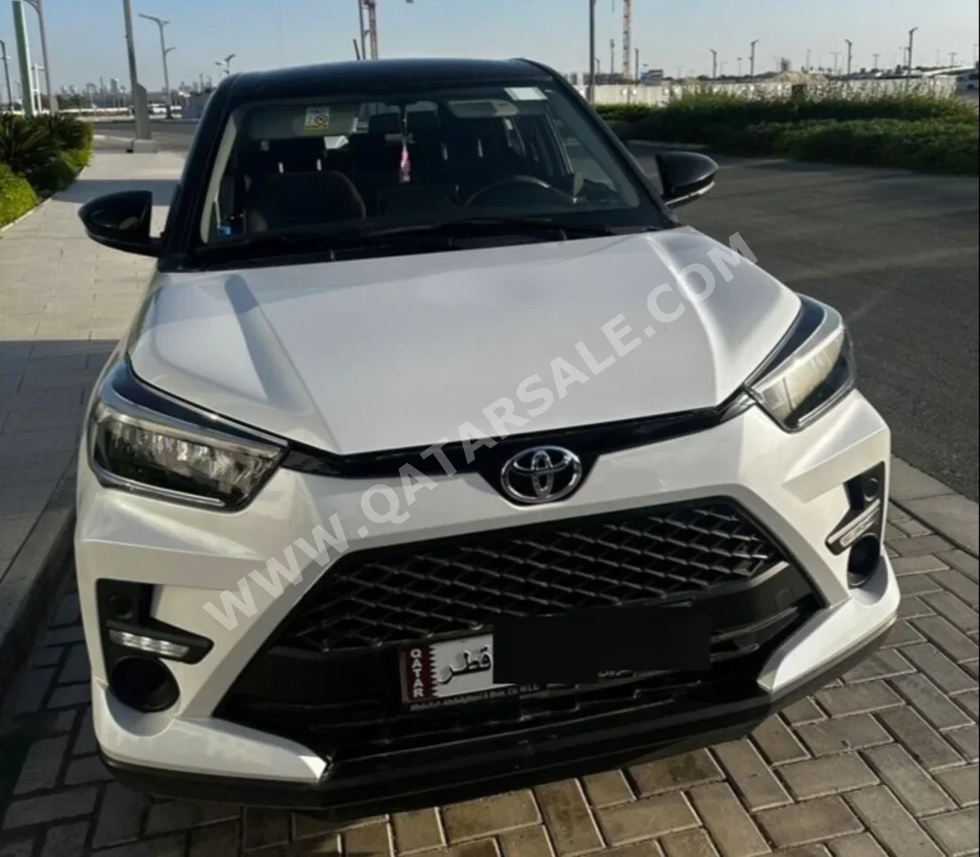 Toyota  Raize  GR  2023  Automatic  33,000 Km  3 Cylinder  Front Wheel Drive (FWD)  SUV  White and Black  With Warranty