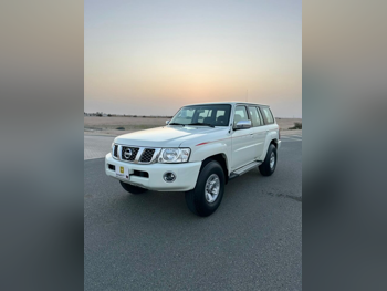 Nissan  Patrol  Safari  2018  Manual  123,000 Km  6 Cylinder  Four Wheel Drive (4WD)  SUV  White