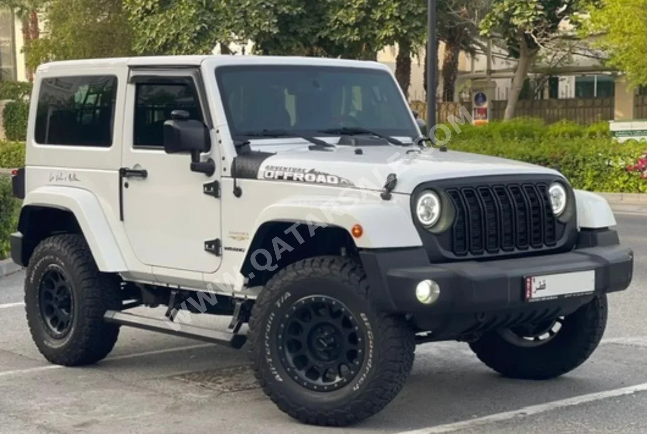 Jeep  Wrangler  Sahara  2015  Automatic  115,000 Km  6 Cylinder  Four Wheel Drive (4WD)  SUV  White