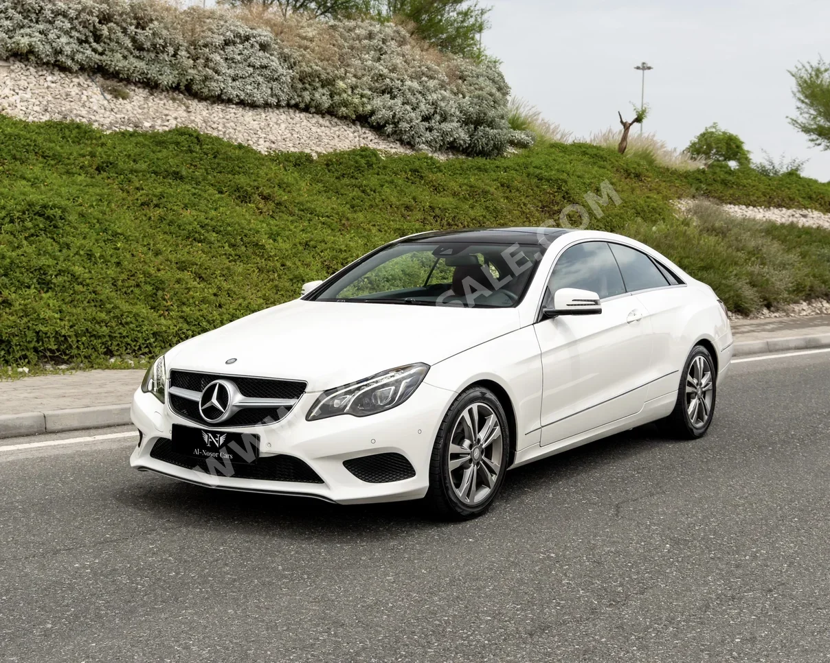 Mercedes-Benz  E-Class  200  2014  Automatic  37,000 Km  4 Cylinder  Rear Wheel Drive (RWD)  Coupe / Sport  White