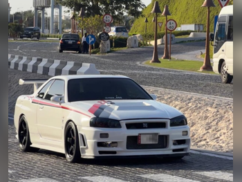 Nissan  Skyline  R34 GT-R  1994  Manual  200,000 Km  6 Cylinder  Rear Wheel Drive (RWD)  Coupe / Sport  White