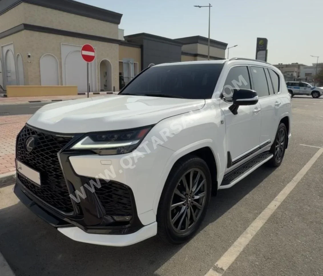 Lexus  LX  600 F Sport  2023  Automatic  85,000 Km  6 Cylinder  Four Wheel Drive (4WD)  SUV  White  With Warranty