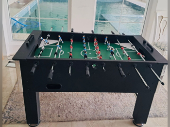 Black and Green Foosball Table