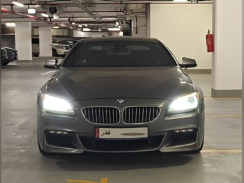 بي ام دبليو  الفئة - السادسة  650i  2012  اوتوماتيك  96,000 كم  8 سلندر  دفع خلفي  سيدان  رمادي فانتوم