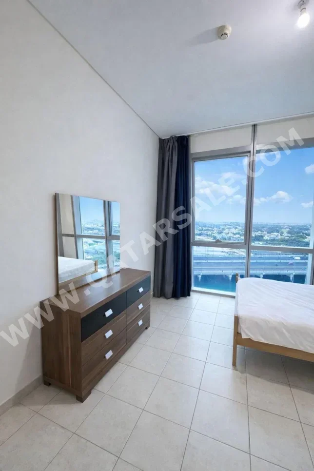 2 Bedrooms  Hotel Apartment  For Rent  in Doha -  The Pearl  Fully Furnished