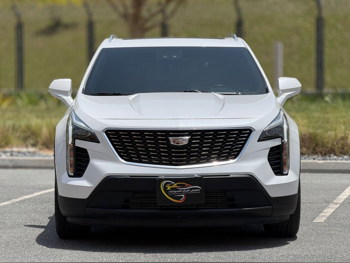 Cadillac  XT4  Premium Luxury  2022  Automatic  68,000 Km  4 Cylinder  All Wheel Drive (AWD)  SUV  White  With Warranty