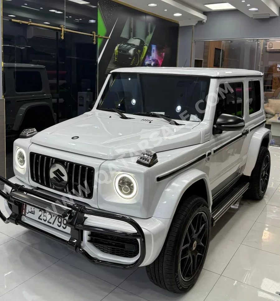Suzuki  Jimny  2020  Automatic  54,000 Km  4 Cylinder  Four Wheel Drive (4WD)  SUV  White