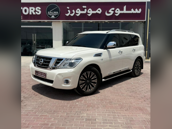 نيسان  باترول  بلاتنيوم  2014  اوتوماتيك  255,000 كم  8 سلندر  دفع رباعي  اس يو في  أبيض