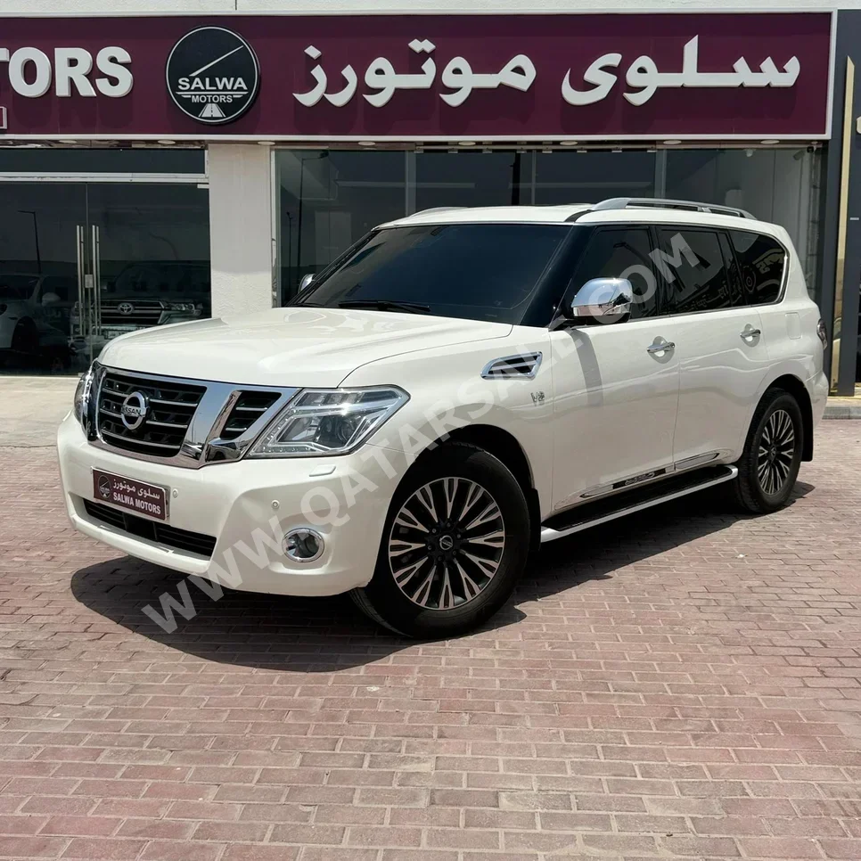 نيسان باترول بلاتنيوم 2014 اوتوماتيك 255,000 كم 8 سلندر دفع رباعي اس يو في أبيض