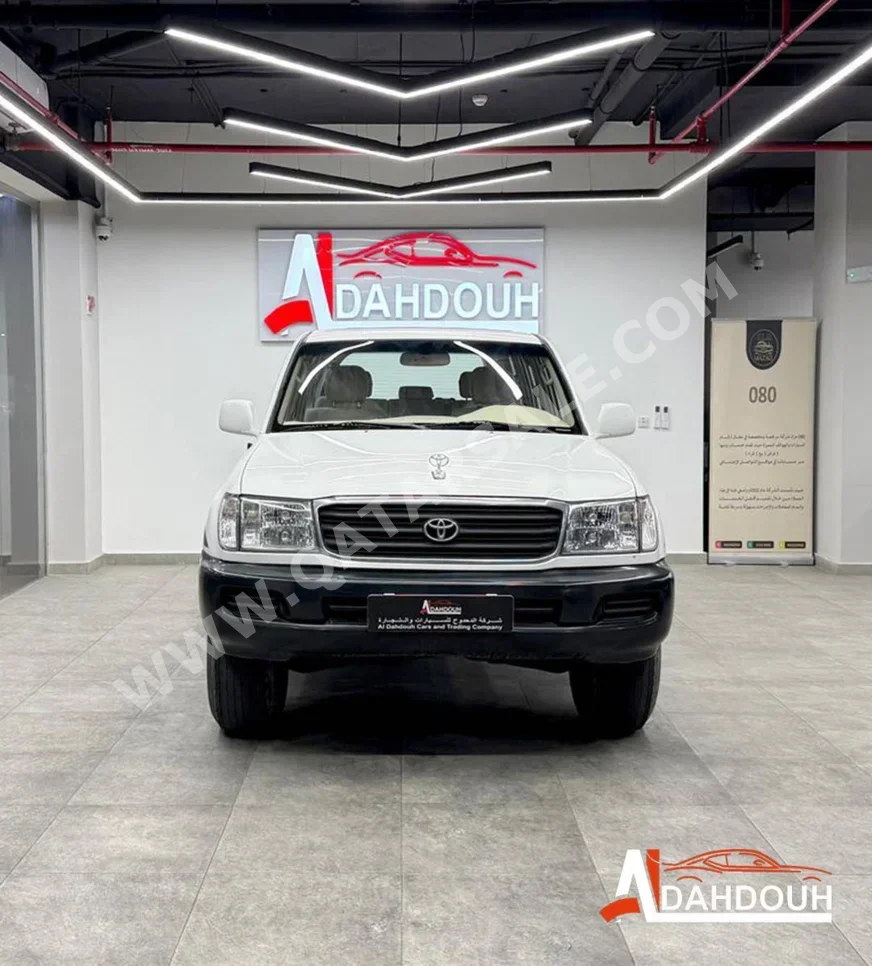 Toyota  Land Cruiser  GX  2003  Manual  573,000 Km  6 Cylinder  Four Wheel Drive (4WD)  SUV  White