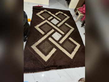 السجاد بنى