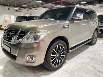 Nissan Patrol Platinum 2015 Automatic 303,000 Km 8 Cylinder Four Wheel Drive (4WD) SUV Gold