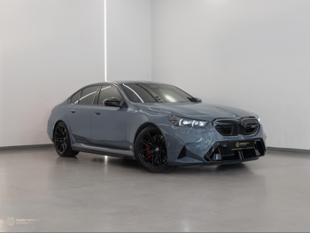 BMW  M-Series  5  2025  Automatic  12,091 Km  8 Cylinder  Rear Wheel Drive (RWD)  Sedan  Gray  With Warranty