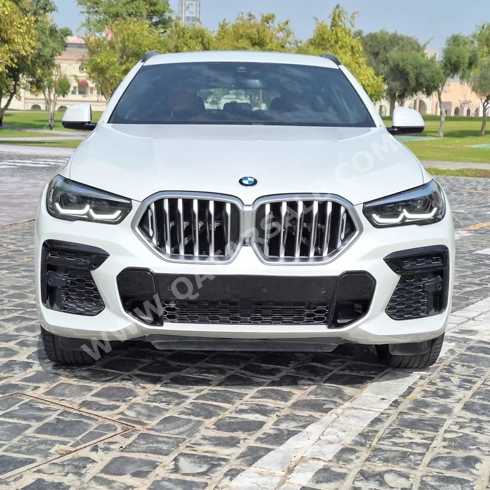 BMW  X-Series  X6 40i  2022  Automatic  65,000 Km  6 Cylinder  All Wheel Drive (AWD)  SUV  White