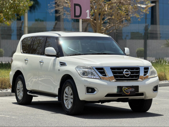 Nissan  Patrol  SE  2015  Automatic  315,000 Km  8 Cylinder  Four Wheel Drive (4WD)  SUV  White