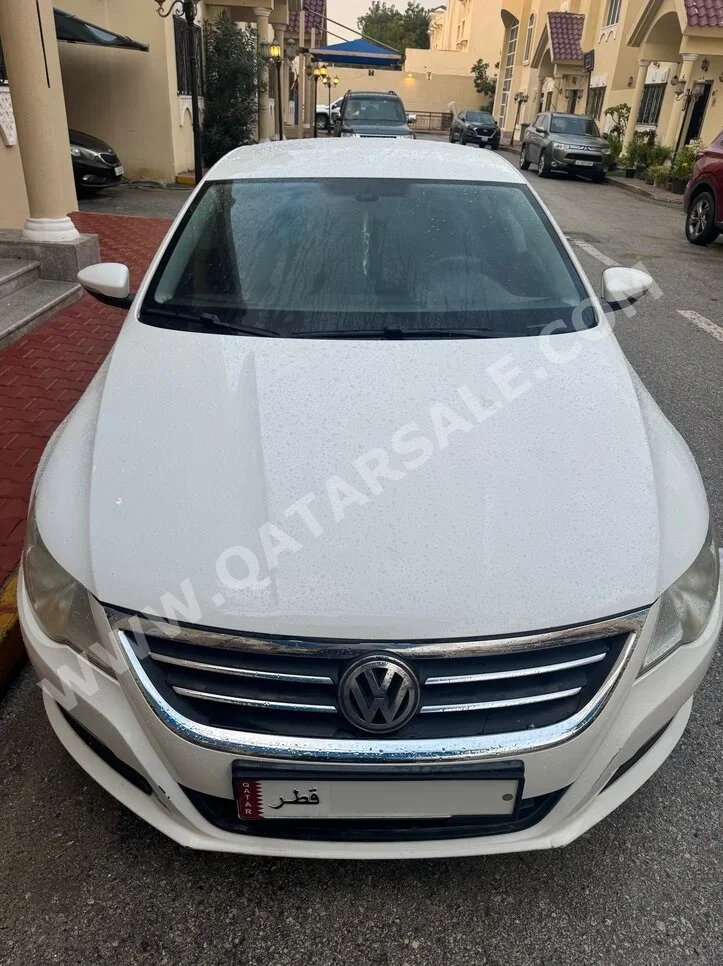 Volkswagen  Passat  CC  2012  Automatic  153,000 Km  4 Cylinder  Front Wheel Drive (FWD)  Sedan  White