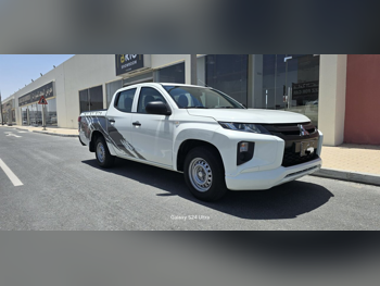 ميتسوبيشي  ال 200  2023  عادي  68,000 كم  4 سلندر  دفع خلفي  بيكب  أبيض
