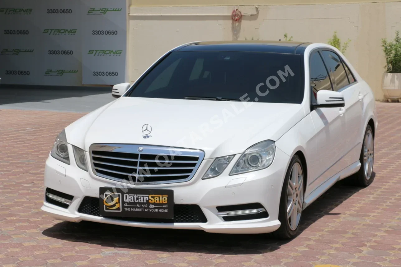 Mercedes-Benz  E-Class  300  2013  Automatic  80,000 Km  6 Cylinder  Rear Wheel Drive (RWD)  Sedan  White