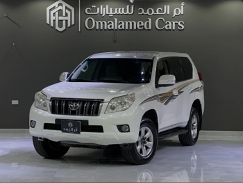 Toyota  Prado  2012  Automatic  330,000 Km  4 Cylinder  Four Wheel Drive (4WD)  SUV  White
