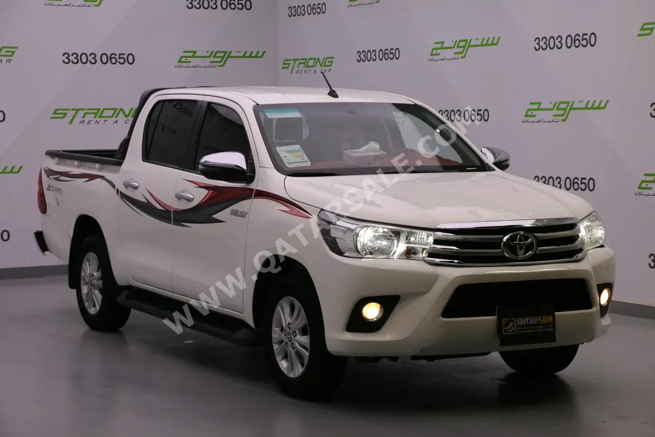 Toyota  Hilux  2023  Automatic  24,000 Km  4 Cylinder  Rear Wheel Drive (RWD)  Pick Up  White