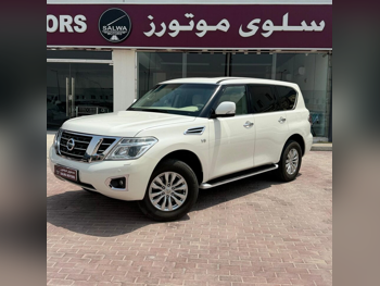 نيسان  باترول  اس اي  2015  اوتوماتيك  208,000 كم  8 سلندر  دفع رباعي  اس يو في  أبيض
