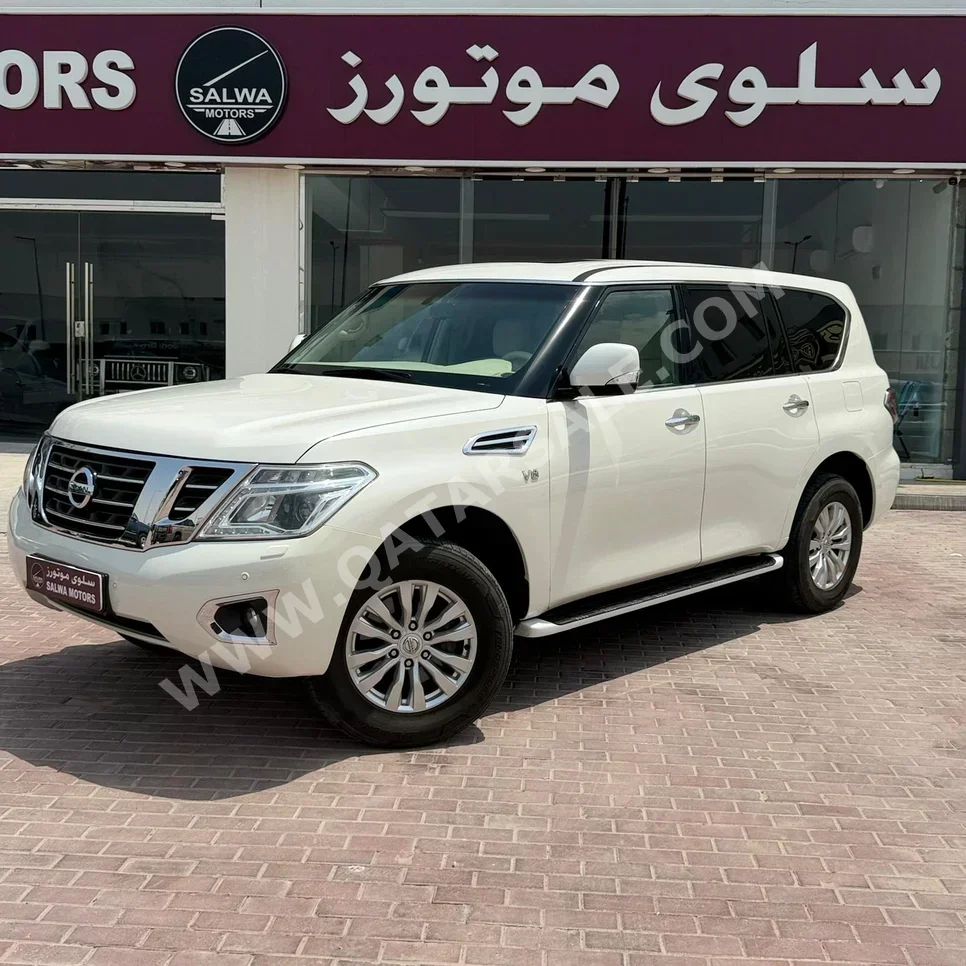 Nissan  Patrol  SE  2015  Automatic  208,000 Km  8 Cylinder  Four Wheel Drive (4WD)  SUV  White