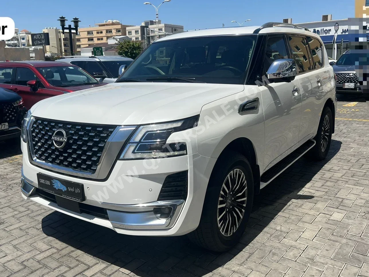 Nissan Patrol Platinum 2022 Automatic 53,000 Km 6 Cylinder Four Wheel Drive (4WD) SUV Pearl