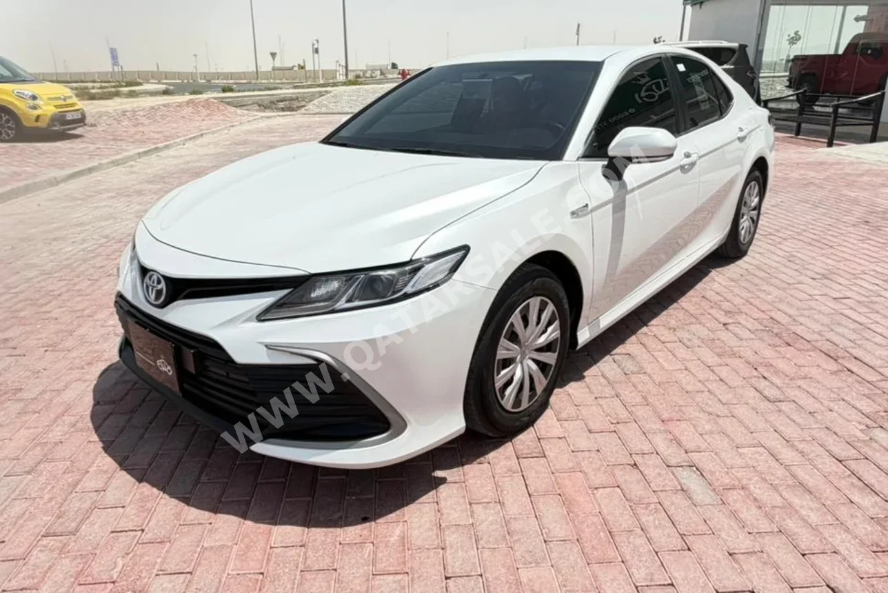 Toyota  Camry  GL  2024  Automatic  54,000 Km  4 Cylinder  Front Wheel Drive (FWD)  Sedan  White  With Warranty