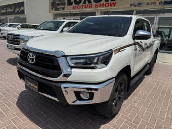 Toyota  Hilux  2024  Automatic  12,000 Km  4 Cylinder  Four Wheel Drive (4WD)  Pick Up  White  With Warranty