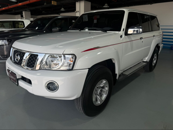 Nissan  Patrol  Safari  2023  Manual  51,000 Km  6 Cylinder  Four Wheel Drive (4WD)  SUV  White  With Warranty