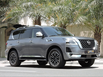 Nissan  Patrol  Platinum  2023  Automatic  59,000 Km  6 Cylinder  Four Wheel Drive (4WD)  SUV  Gray  With Warranty